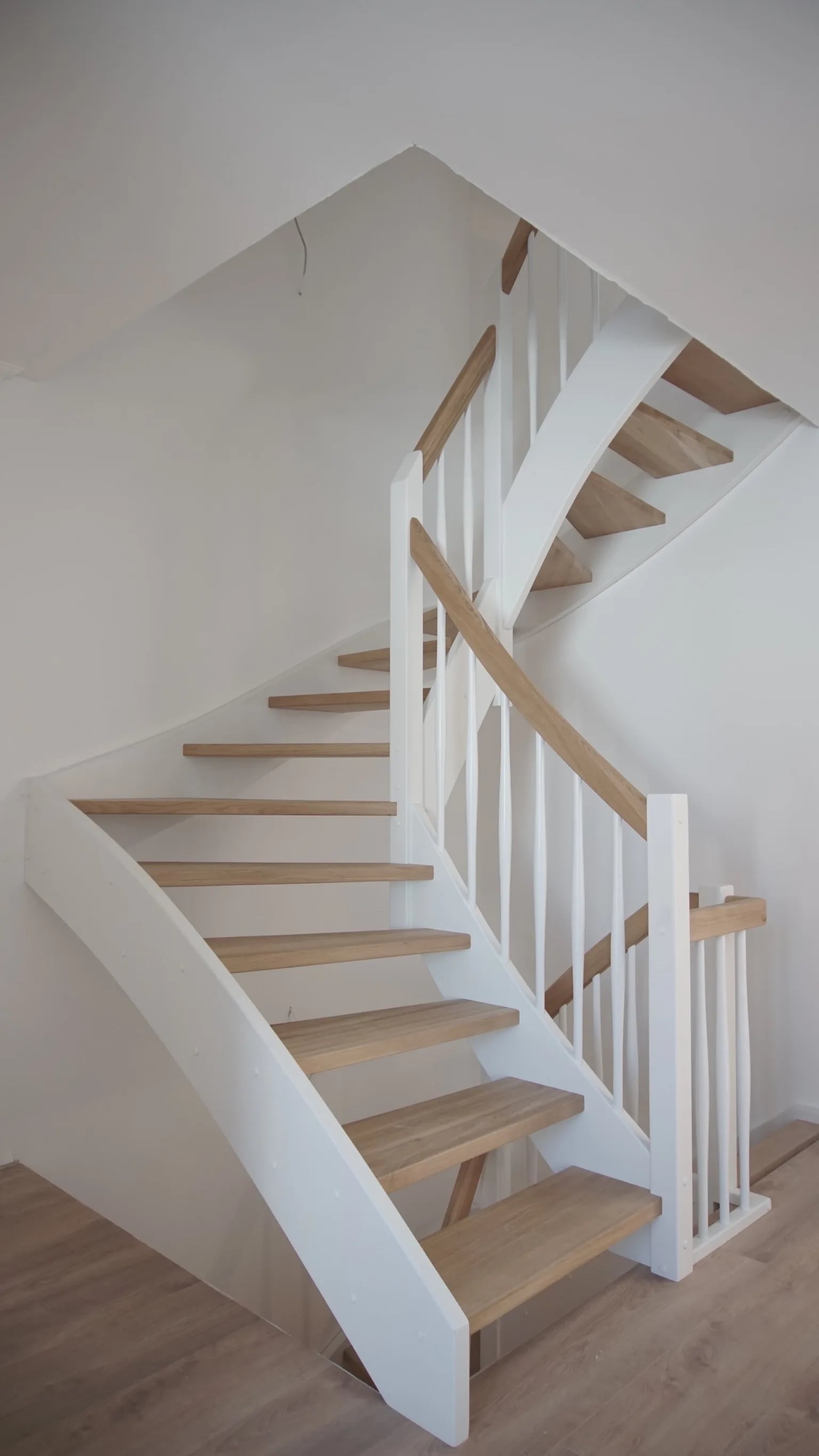 Custom-built oak wood staircase — manufactured in our Witten workshop